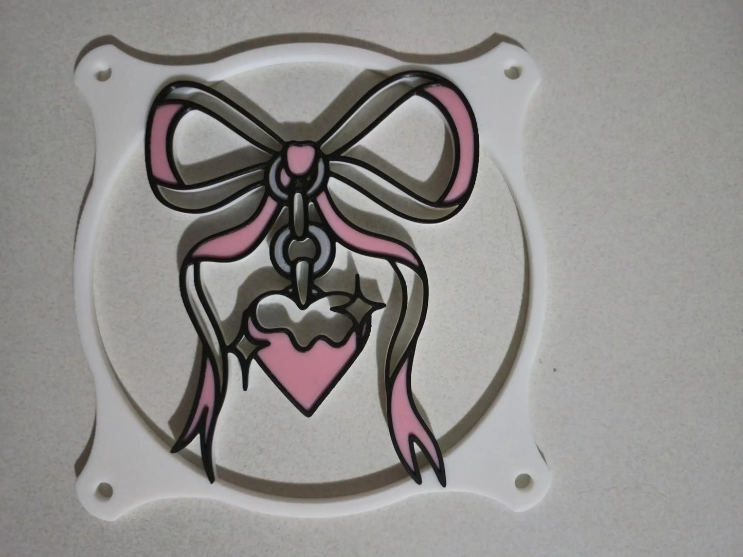 kawaii ribbon custom anime girls PC fan cover grill shroud. Custom gaming PC RGB 120mm 140mm 360mm 280mm. sakura cherry blossom heart star pink white black red May include: Two black framed images of a pink anime character with long pink hair. The character is wearing a red and white outfit with a black choker. The character is posed in different positions in each image. The background is a pink color with a floral pattern. The text '© kitsune kingdom' is in the bottom left corner of the