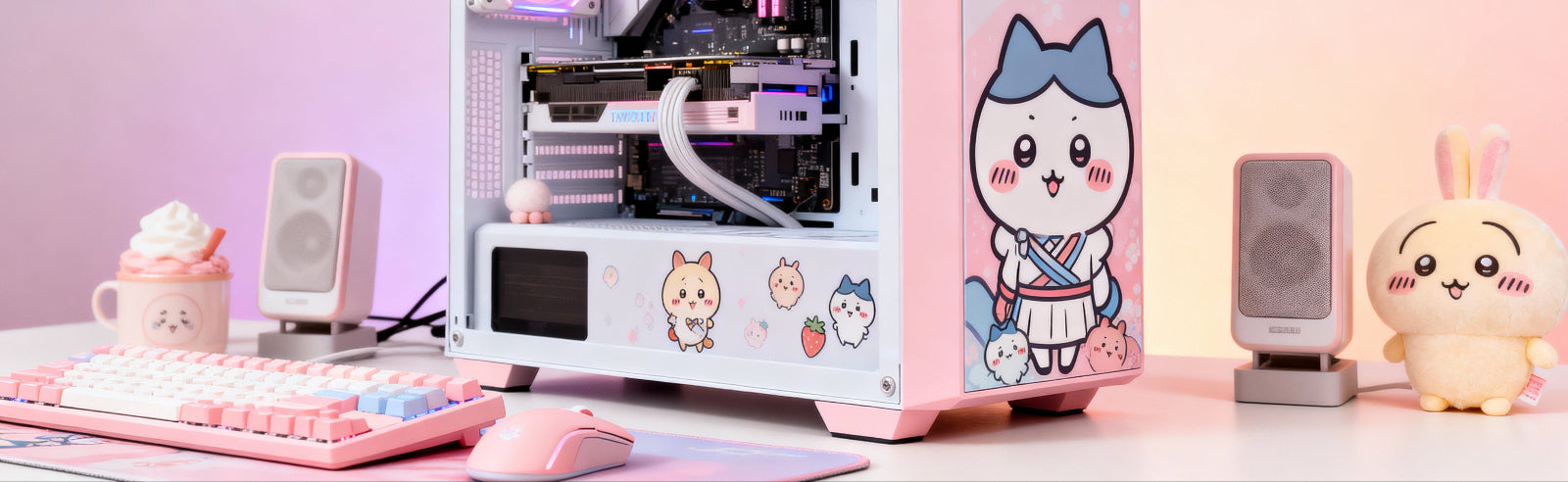 Pink computer case with cartoon design on a desk with accessories