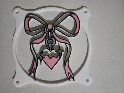 kawaii ribbon custom anime girls PC fan cover grill shroud. Custom gaming PC RGB 120mm 140mm 360mm 280mm. sakura cherry blossom heart star pink white black red May include: Two black framed images of a pink anime character with long pink hair. The character is wearing a red and white outfit with a black choker. The character is posed in different positions in each image. The background is a pink color with a floral pattern. The text &#39;© kitsune kingdom&#39; is in the bottom left corner of the